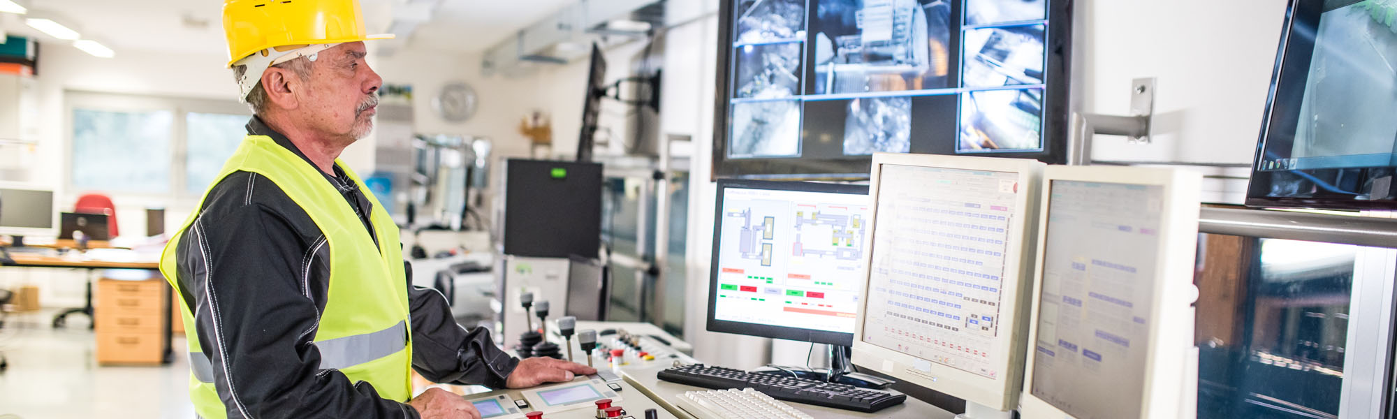 Engineer working at control panel