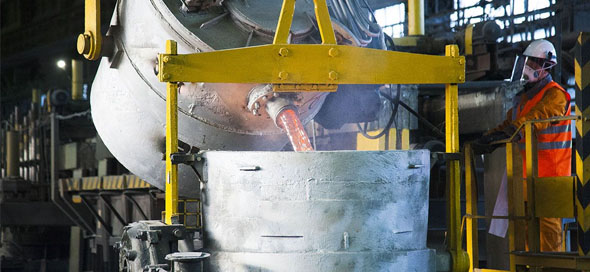 liquid aluminum pouring into bowl