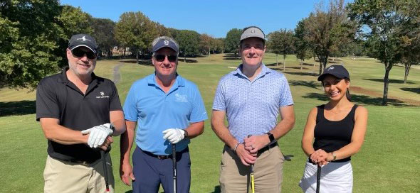 im Rausch, Senior Program Manager at Mesa Associates, Inc., was joined by three other golfers, Curt Westerman, Danielle Castley, and David Headrick