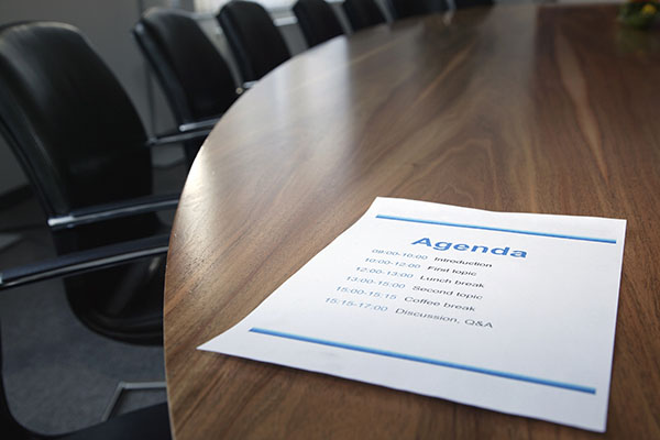 Agenda on boardroom table