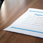 Agenda on boardroom table